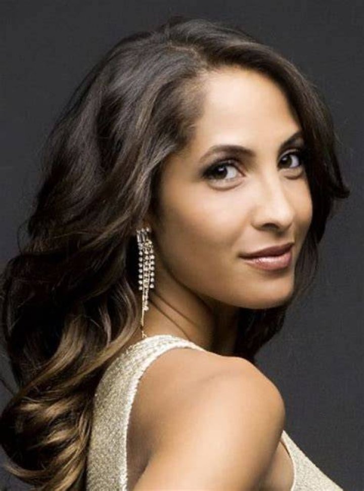 Christel Khalil posing in a side look